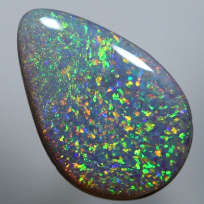 SOLID SEMI BLACK OPAL Pinfire pattern with sparkling orange and green SEE VIDEO